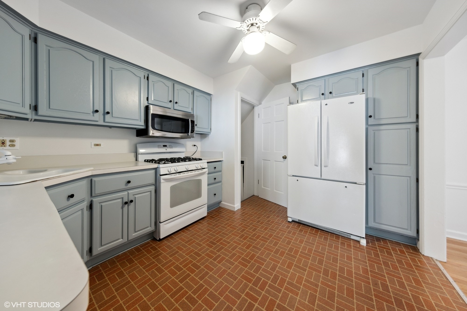 Undisclosed Address Western Springs, IL 60558 - Photo 6 of 15 a kitchen with white cabinets and white appliances