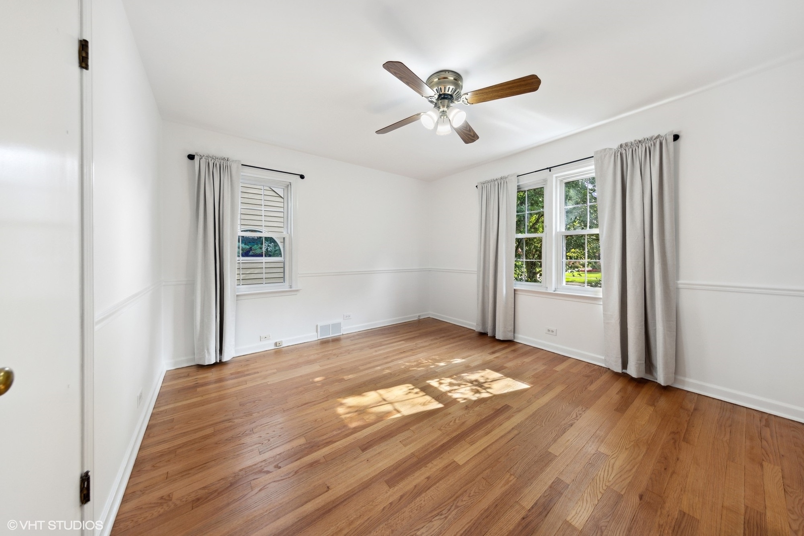 Undisclosed Address Western Springs, IL 60558 - Photo 9 of 15 a view of a livingroom with a window and wooden floor
