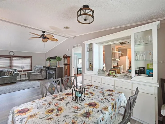 a view of a dining room with furniture