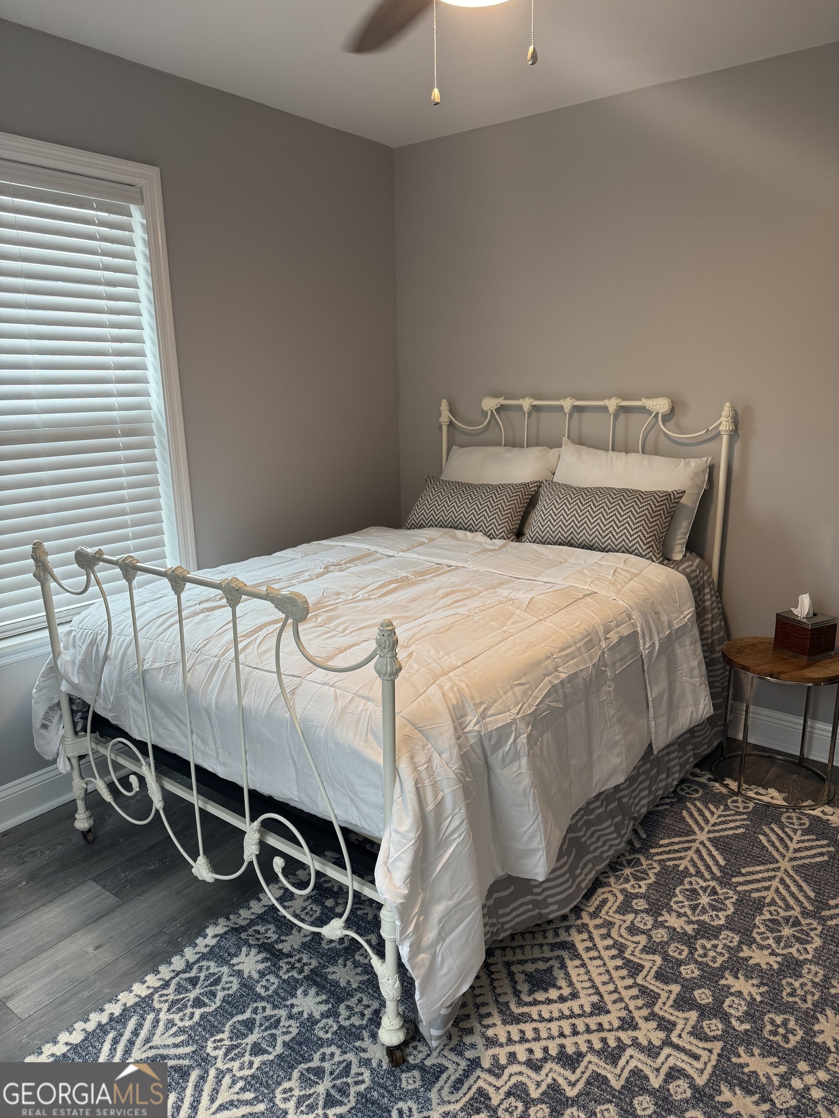 339 North Gray Street Millen, GA 30442 - Photo 11 of 16 a bedroom with a bed and a window