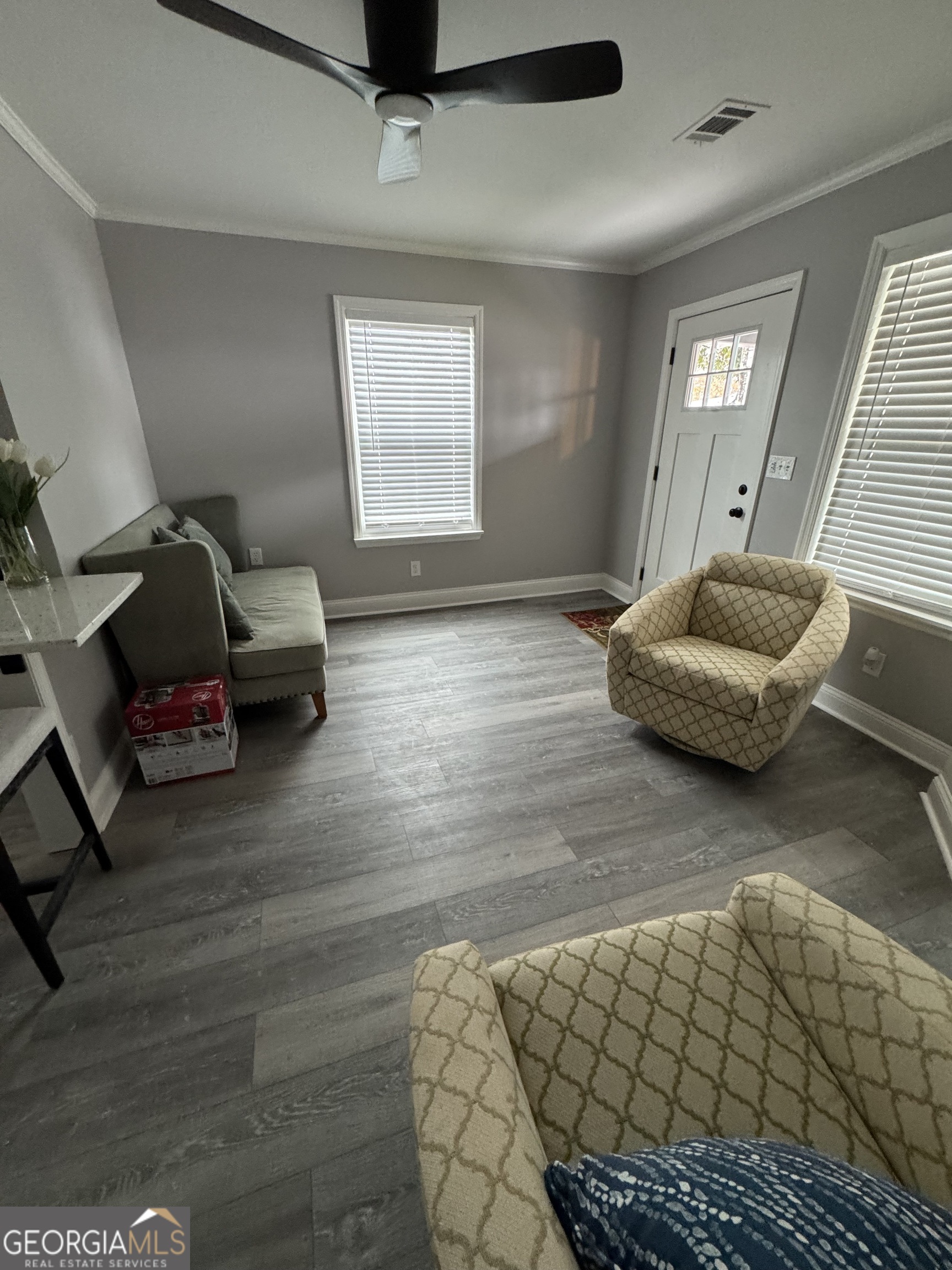 339 North Gray Street Millen, GA 30442 - Photo 3 of 16 a living room with furniture and a window