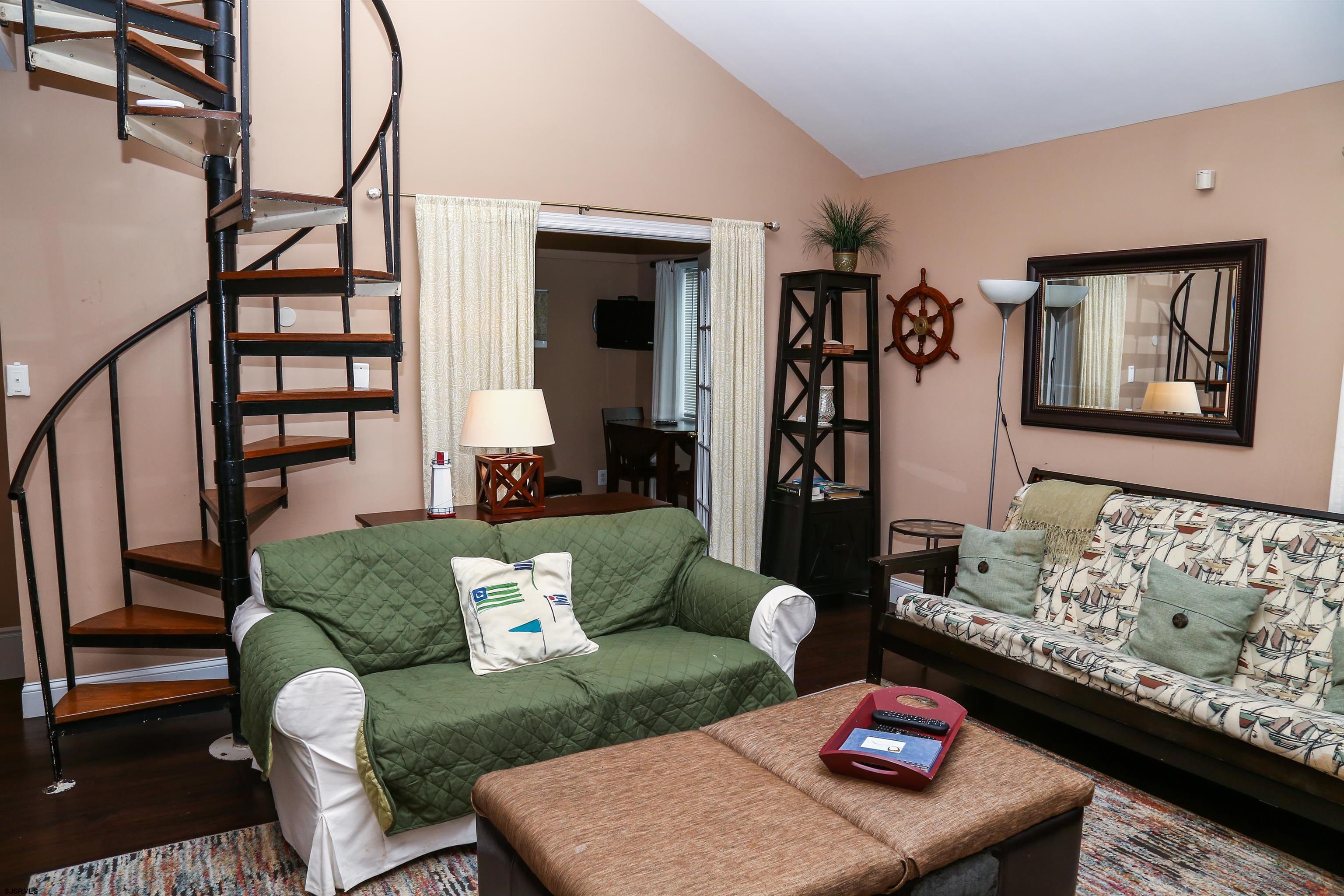 4818 Harbor Beach Boulevard Brigantine, NJ 08203 - Photo 13 of 30 a living room with furniture and wooden floor