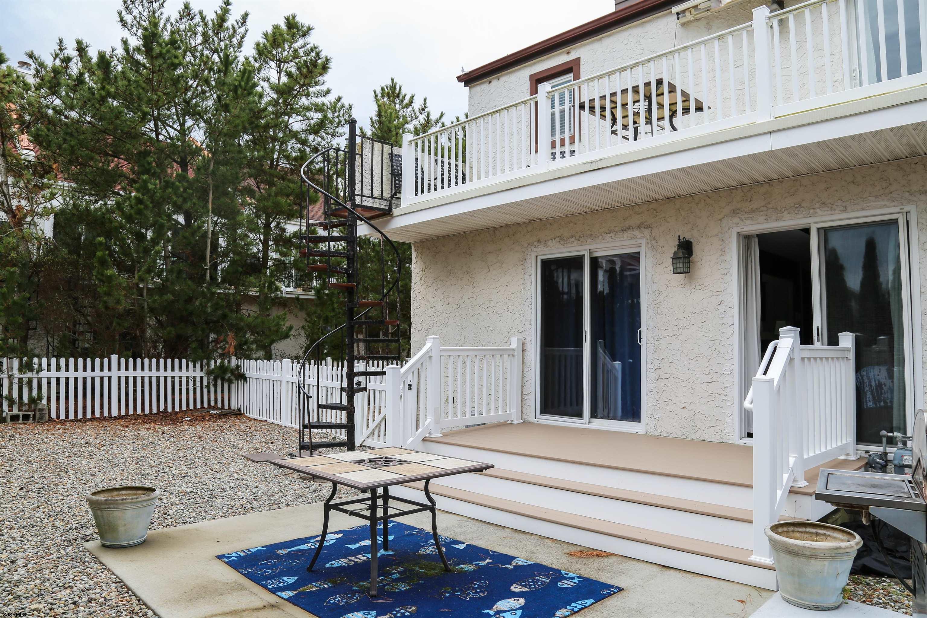 4818 Harbor Beach Boulevard Brigantine, NJ 08203 - Photo 23 of 30 a view of a chair in the patio