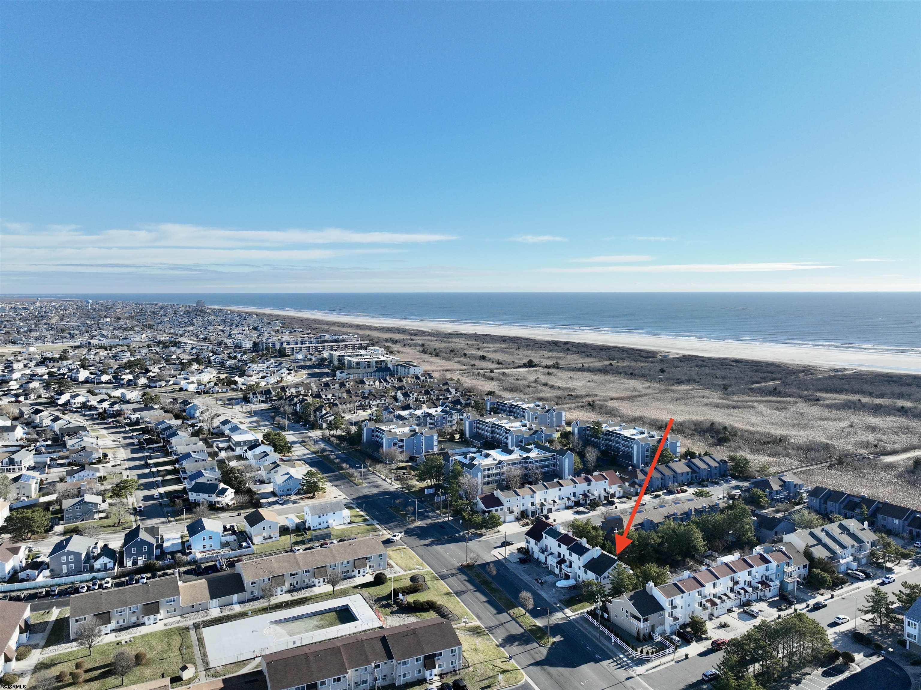 4818 Harbor Beach Boulevard Brigantine, NJ 08203 - Photo 28 of 30 an aerial view of multiple house
