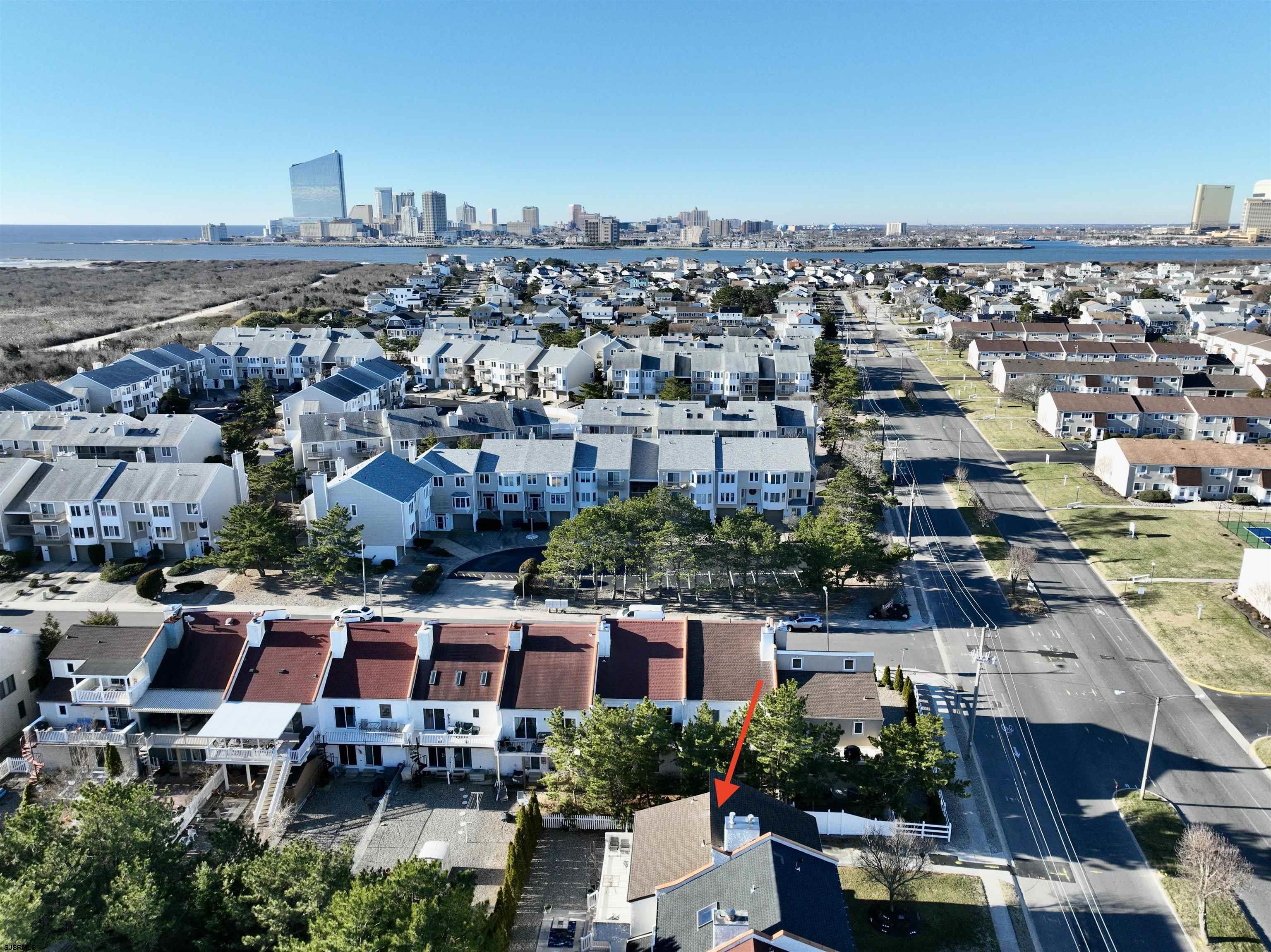 4818 Harbor Beach Boulevard Brigantine, NJ 08203 - Photo 4 of 30 an aerial view of a city