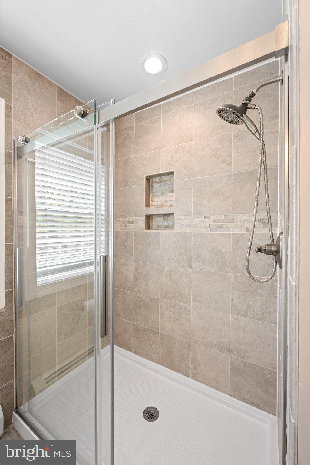 418 Church Road Hatfield, PA 19440 - Photo 31 of 53 Sleek modern shower with elegant tiles.
