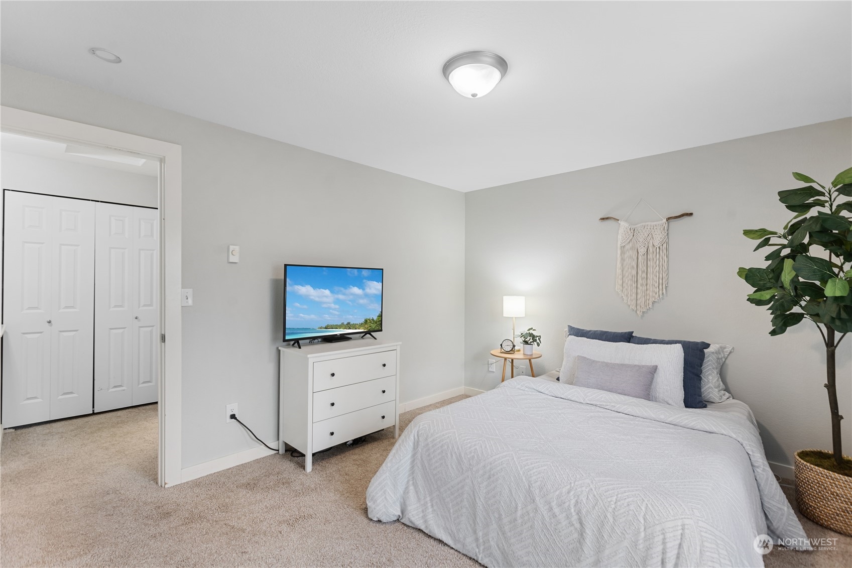 412 Center Road, Unit E2 Everett, WA 98204 - Photo 12 of 18 a bedroom with bed and window