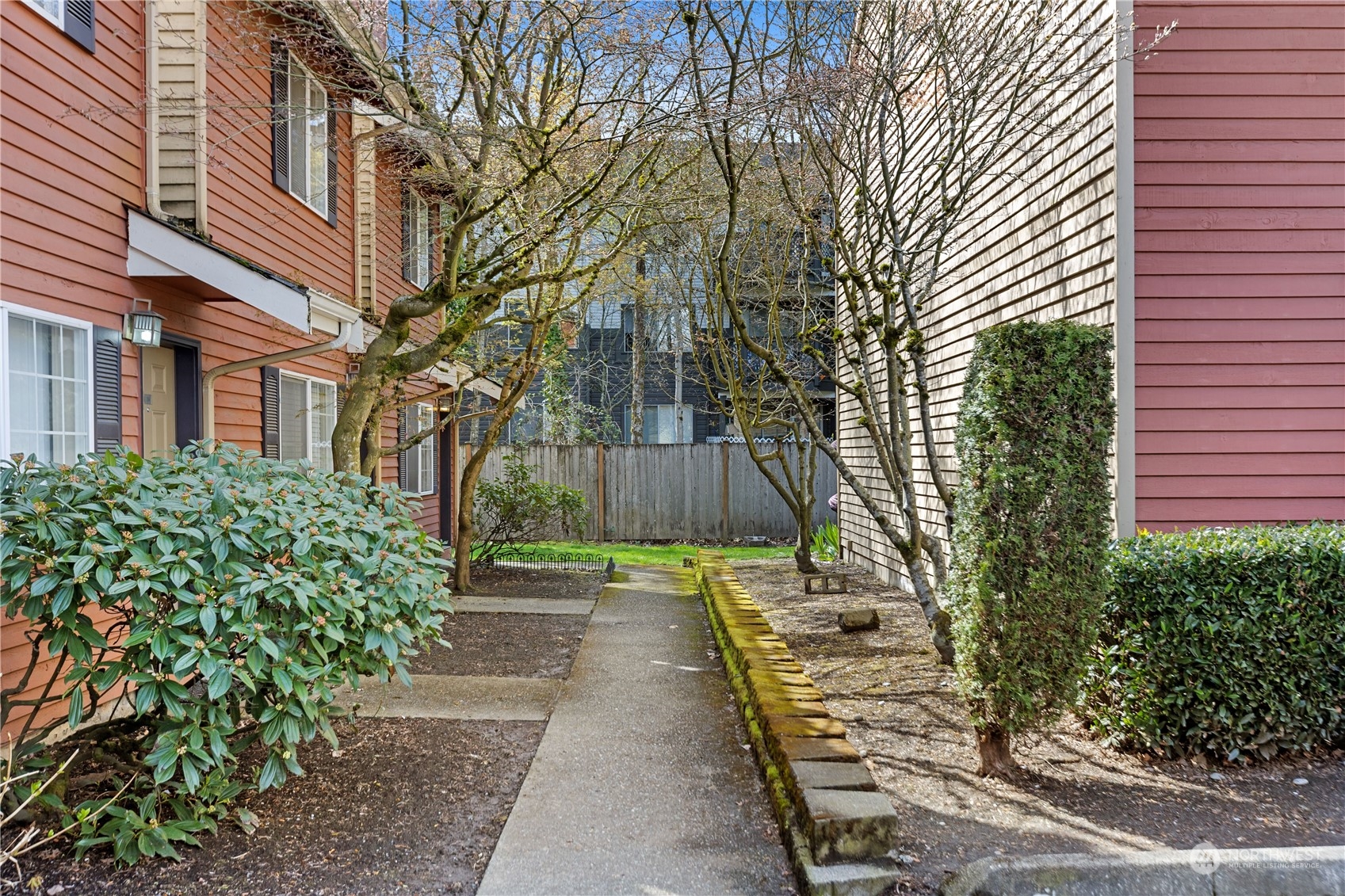412 Center Road, Unit E2 Everett, WA 98204 - Photo 18 of 18 a view of a pathway with a garden