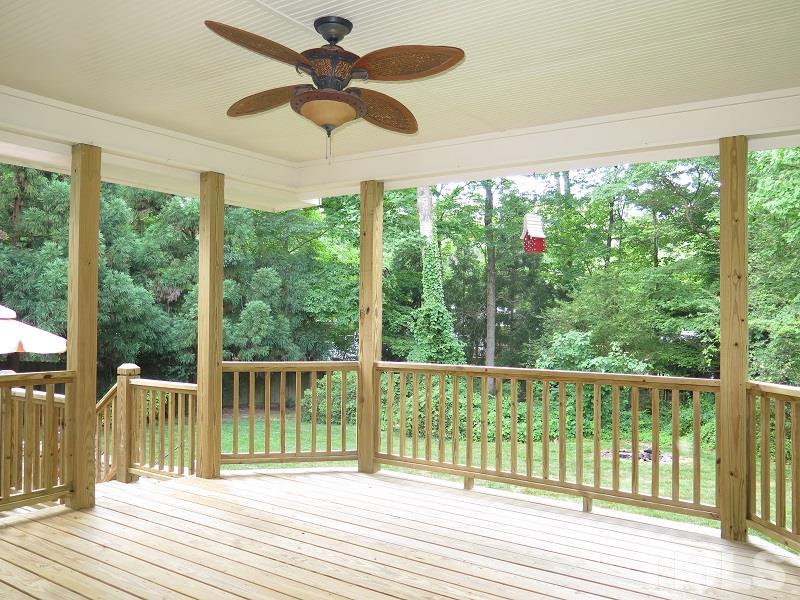 7617 Harps Mill Road Raleigh, NC 27615 - Photo 22 of 24 a view of a city from a balcony