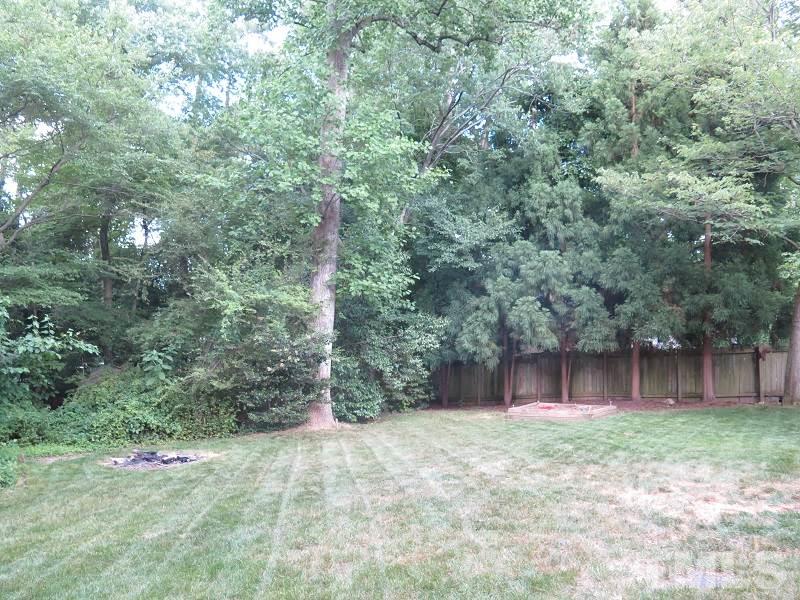 7617 Harps Mill Road Raleigh, NC 27615 - Photo 24 of 24 a front view of a house with a yard