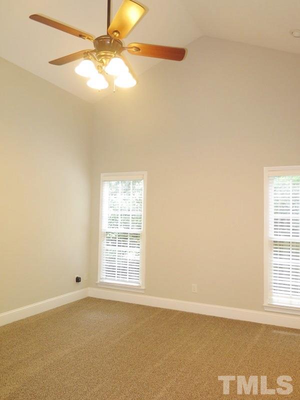7617 Harps Mill Road Raleigh, NC 27615 - Photo 8 of 24 an empty room with a window