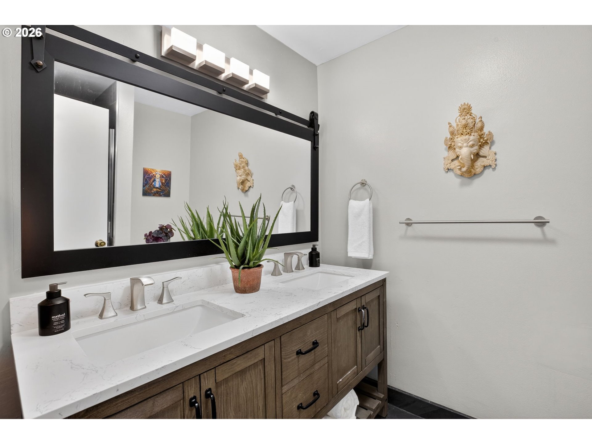 4721 Southwest 45th Avenue Portland, OR 97221 - Photo 18 of 29 a bathroom with a sink and a mirror