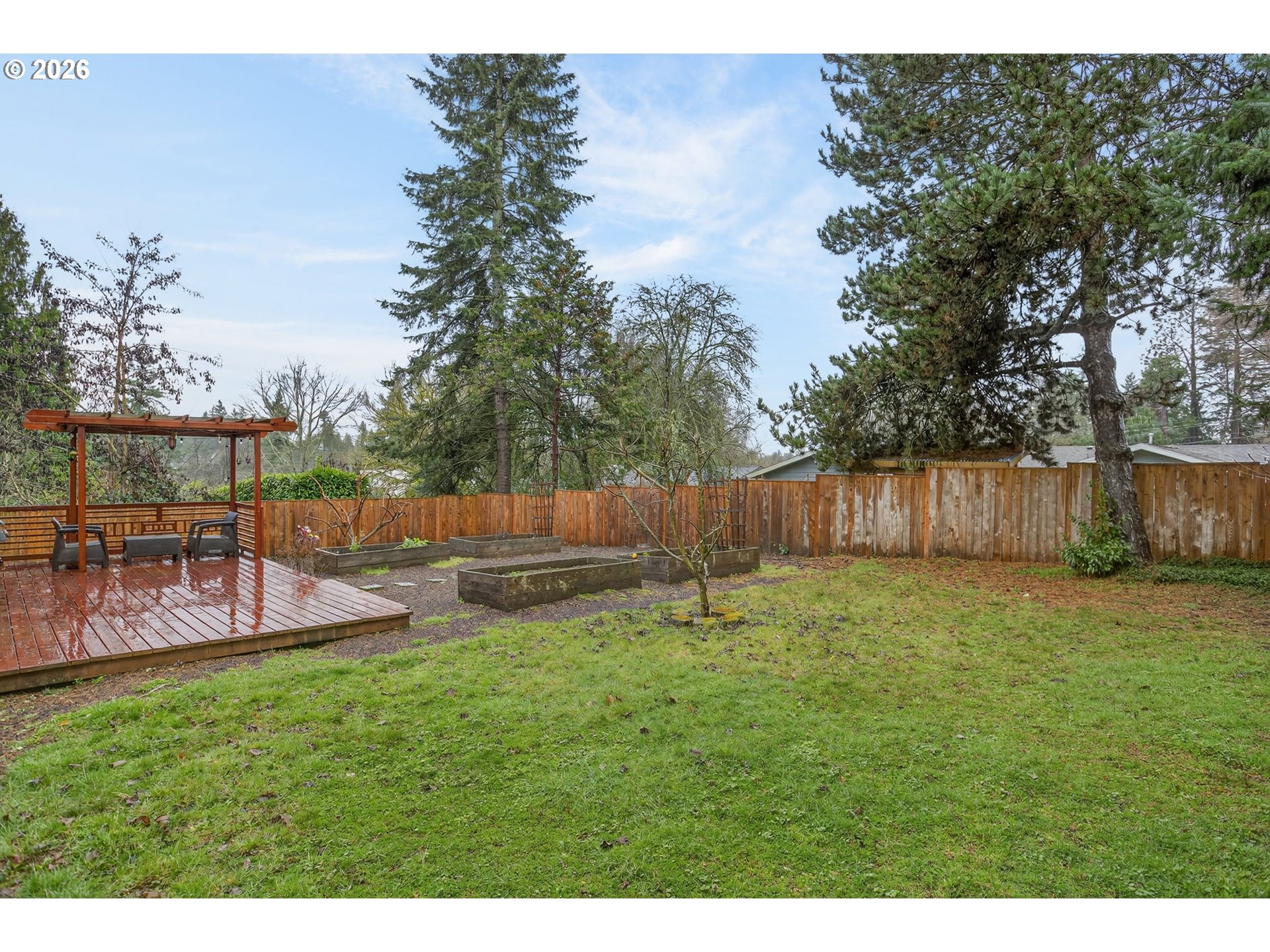 4721 Southwest 45th Avenue Portland, OR 97221 - Photo 24 of 29 a backyard of a house with table and chairs