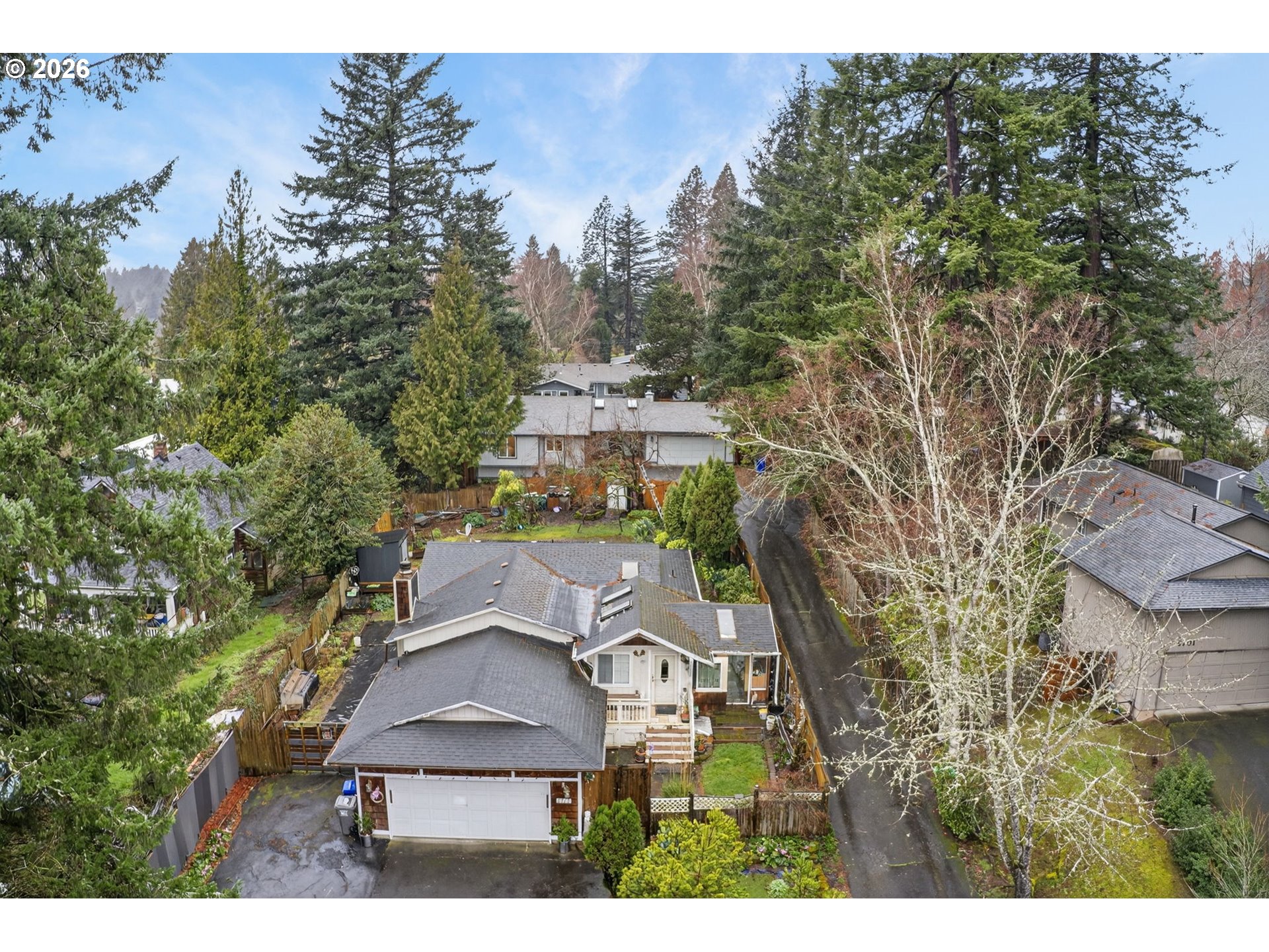4721 Southwest 45th Avenue Portland, OR 97221 - Photo 27 of 29 an aerial view of residential houses with outdoor space and trees