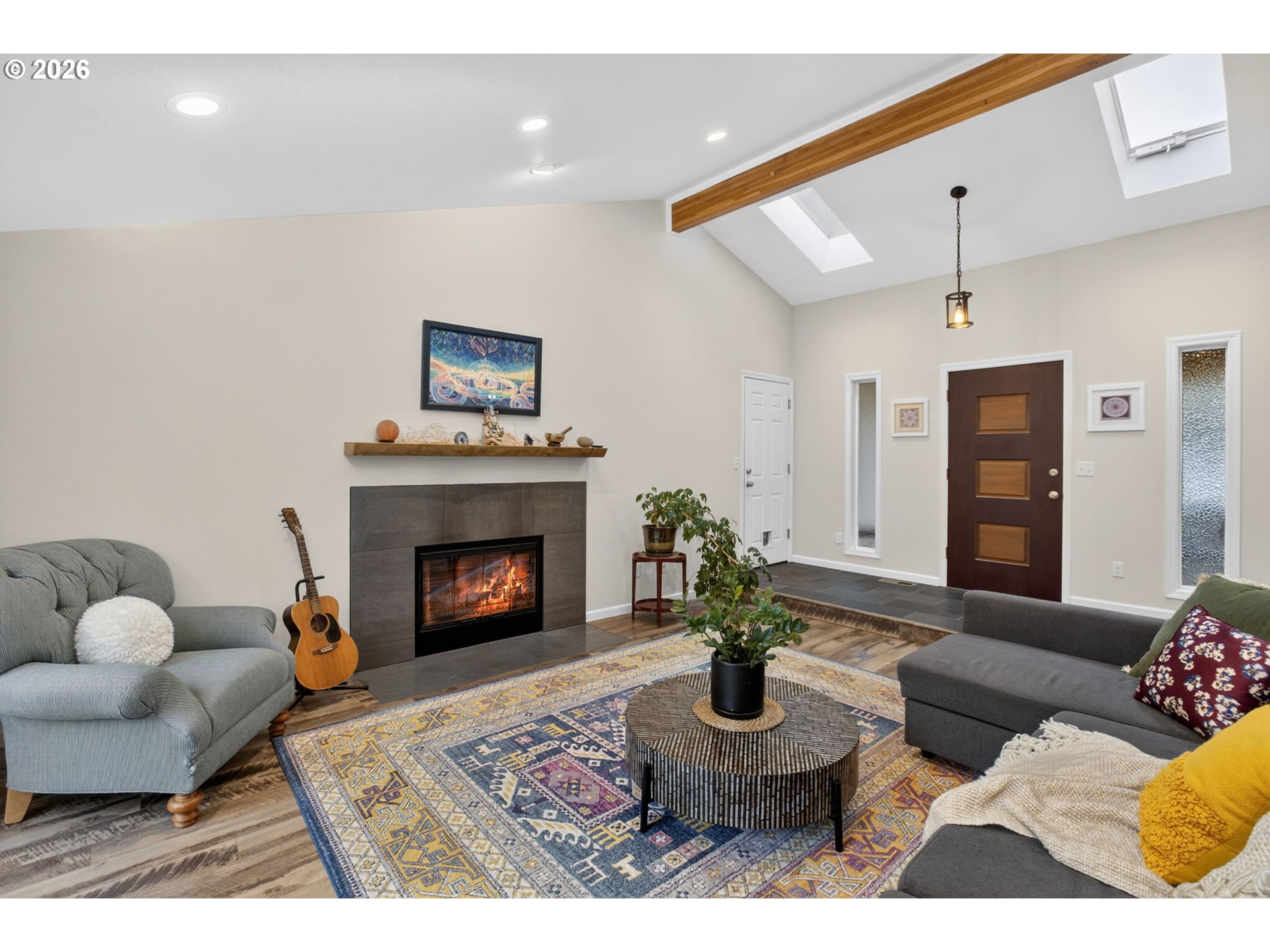 4721 Southwest 45th Avenue Portland, OR 97221 - Photo 7 of 29 a living room with furniture and a fireplace