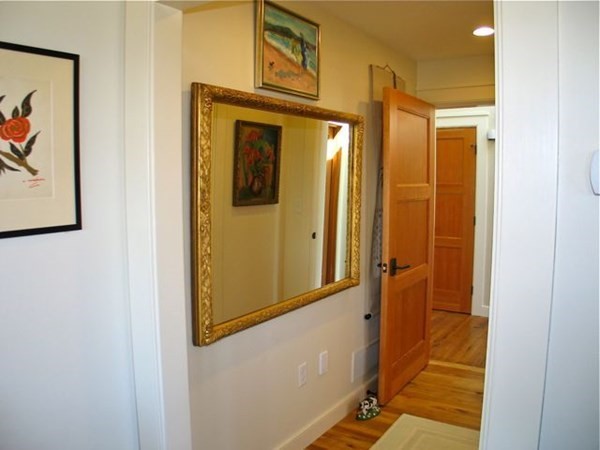 17 Round Pond Road Chilmark, MA 02535 - Photo 15 of 39 a view of a hallway with wooden floor