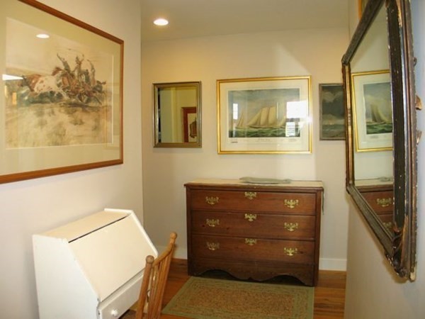 17 Round Pond Road Chilmark, MA 02535 - Photo 25 of 39 a room with a cabinet and a painting on the wall
