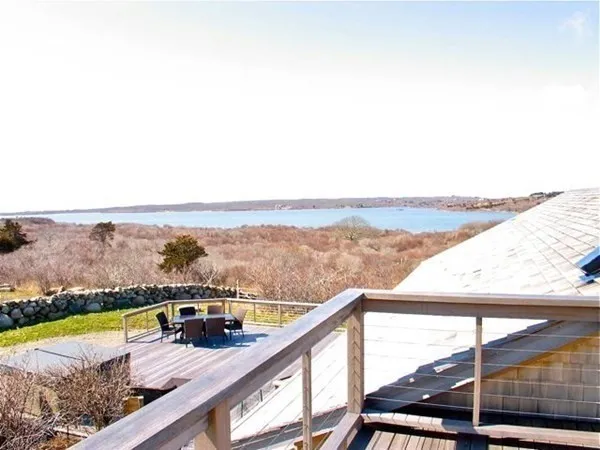 a view of swimming pool with lake view and mountain view
