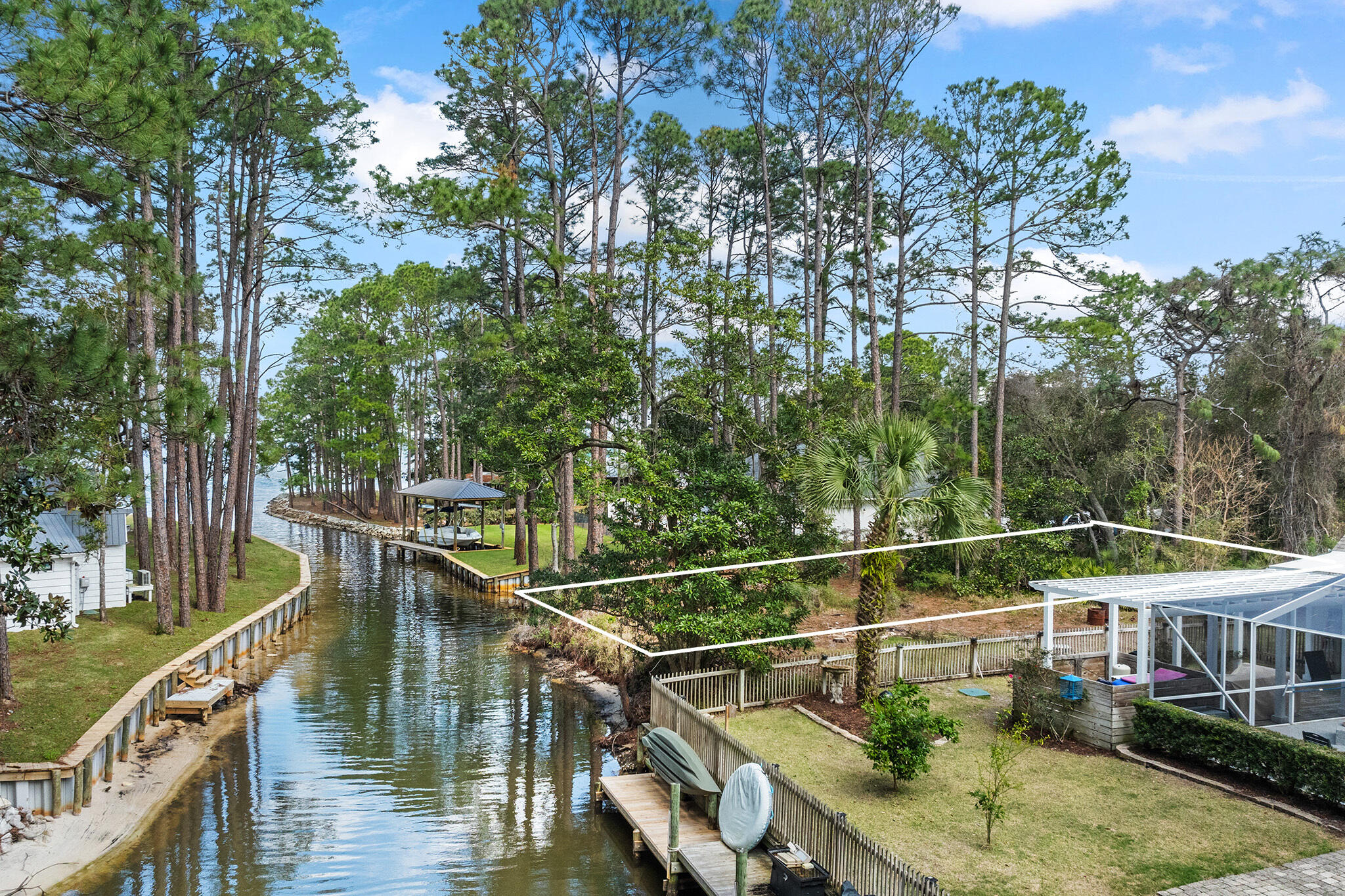 Lot 18 West Hewett Road Santa Rosa Beach, FL 32459 - Photo 2 of 9 a balcony with wooden floor and fence