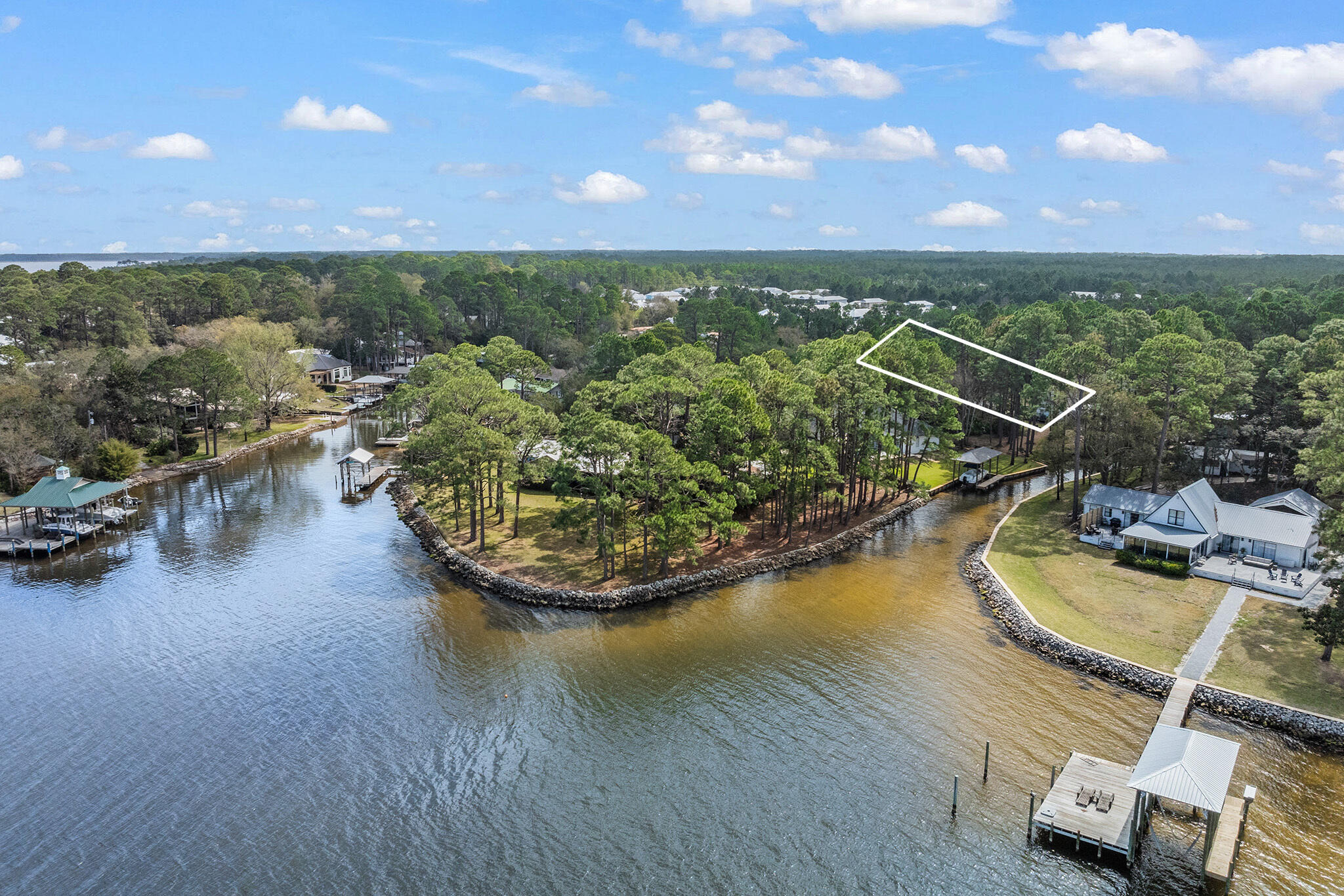 Lot 18 West Hewett Road Santa Rosa Beach, FL 32459 - Photo 6 of 9 a view of a swimming pool and lounge chair