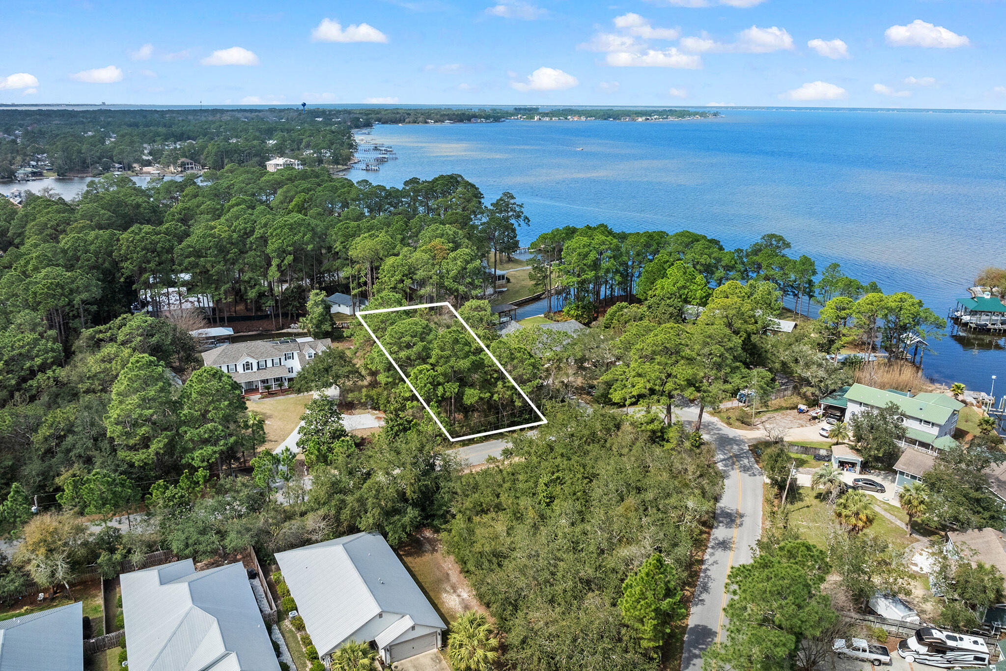 Lot 18 West Hewett Road Santa Rosa Beach, FL 32459 - Photo 9 of 9 a view of a lake with a lake