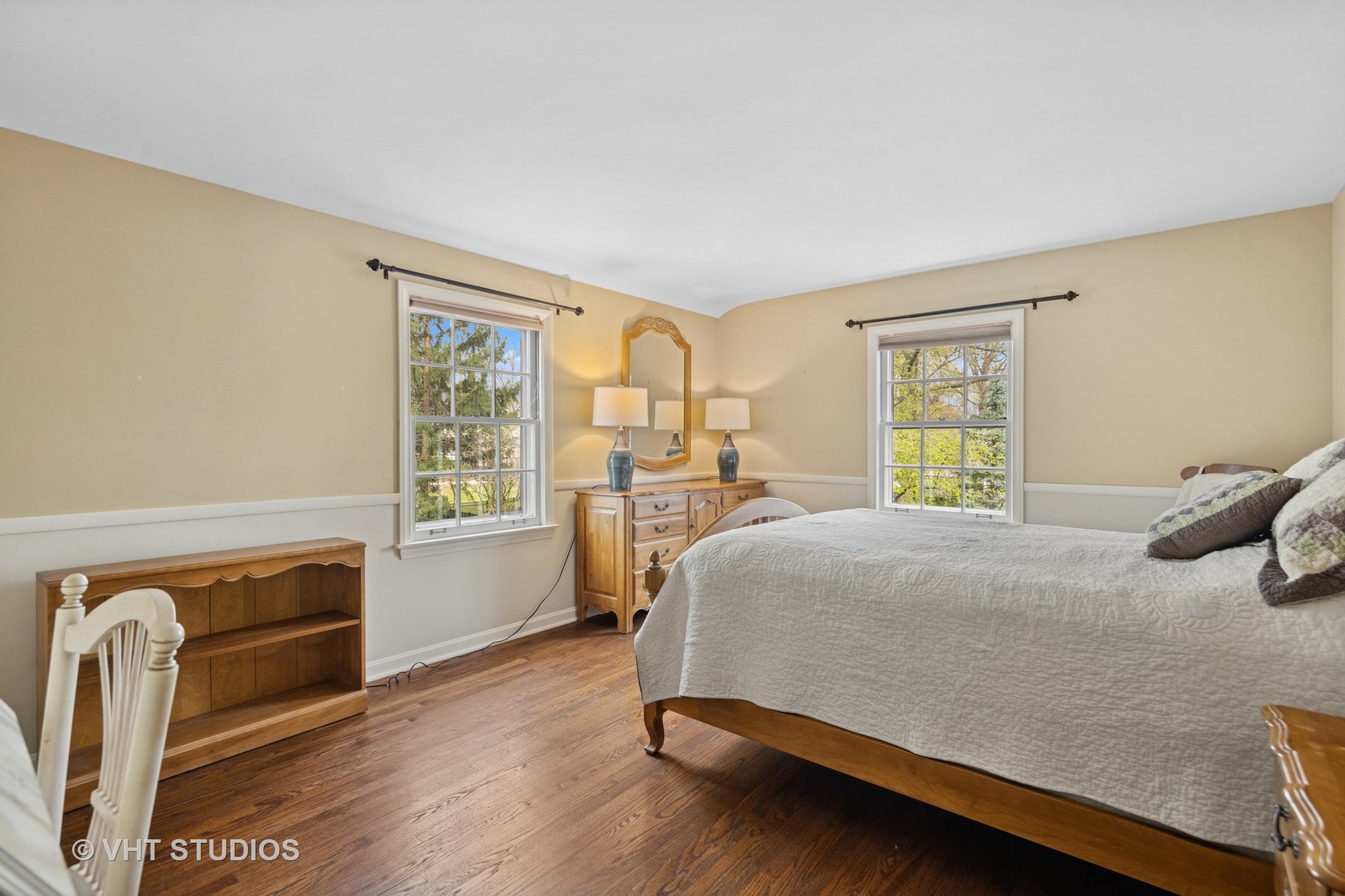 1200 Woodview Road Burr Ridge, IL 60527 - Photo 16 of 22 a bedroom with a bed dresser and a window