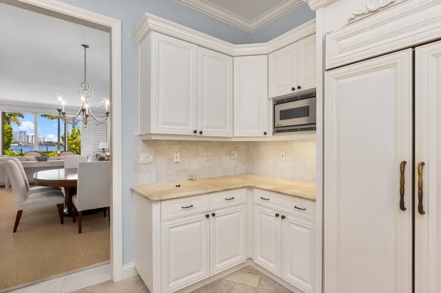 a view of a kitchen with electric appliances