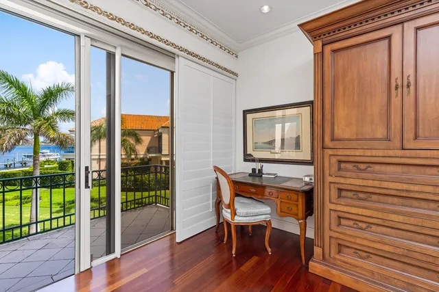 a view of a house with a yard and plants
