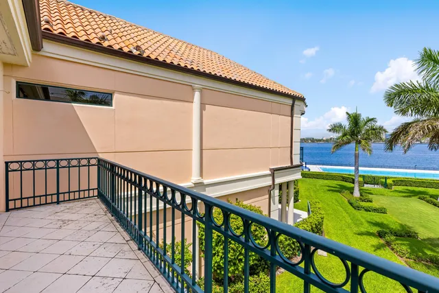 a view of a palm trees in front of a house