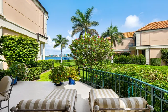 a table and chairs in a garden