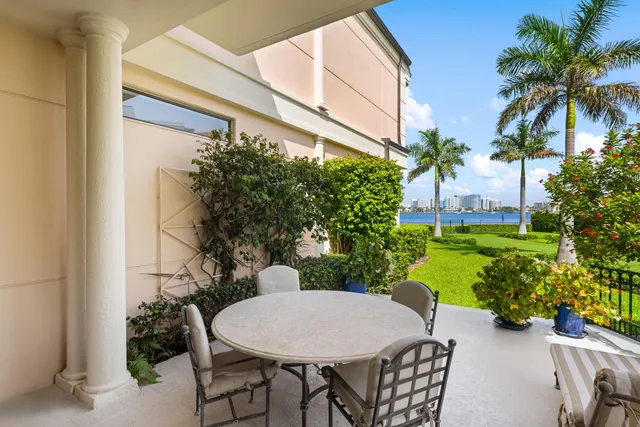 a view of a swimming pool and a chairs