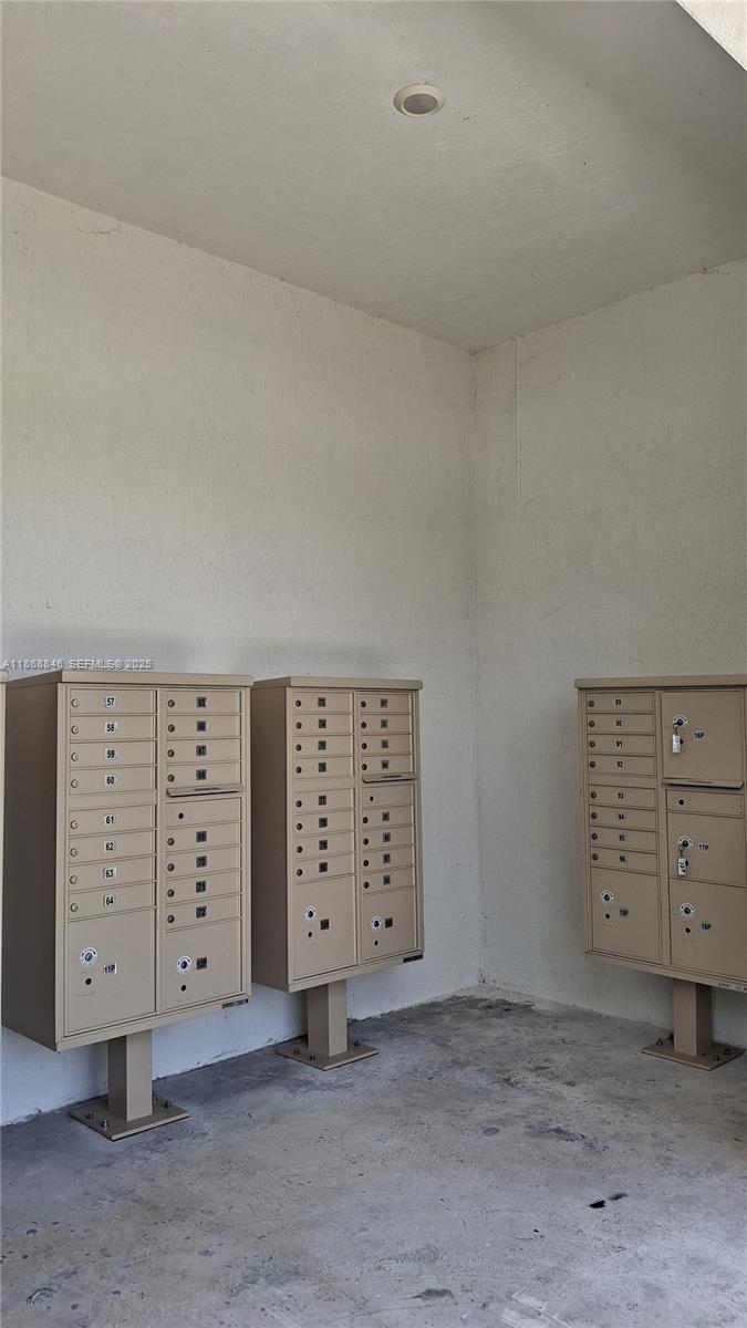26410 Southwest 148th Court Homestead, FL 33032 - Photo 24 of 42 an empty room with a cabinet