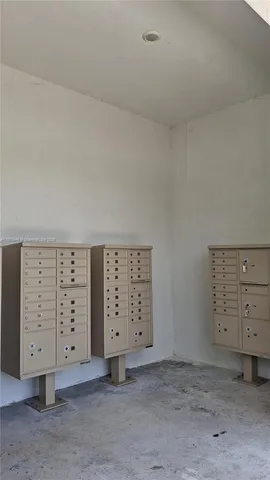 an empty room with a cabinet