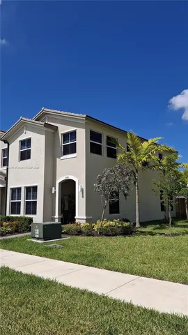 a view of a workspace with furniture