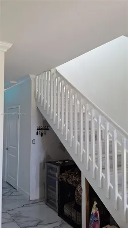 a view of entryway with stairs