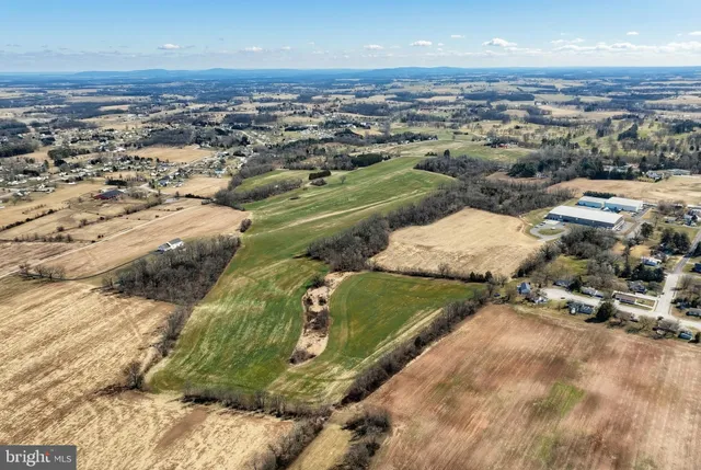 an aerial view of a house with a outdoor space