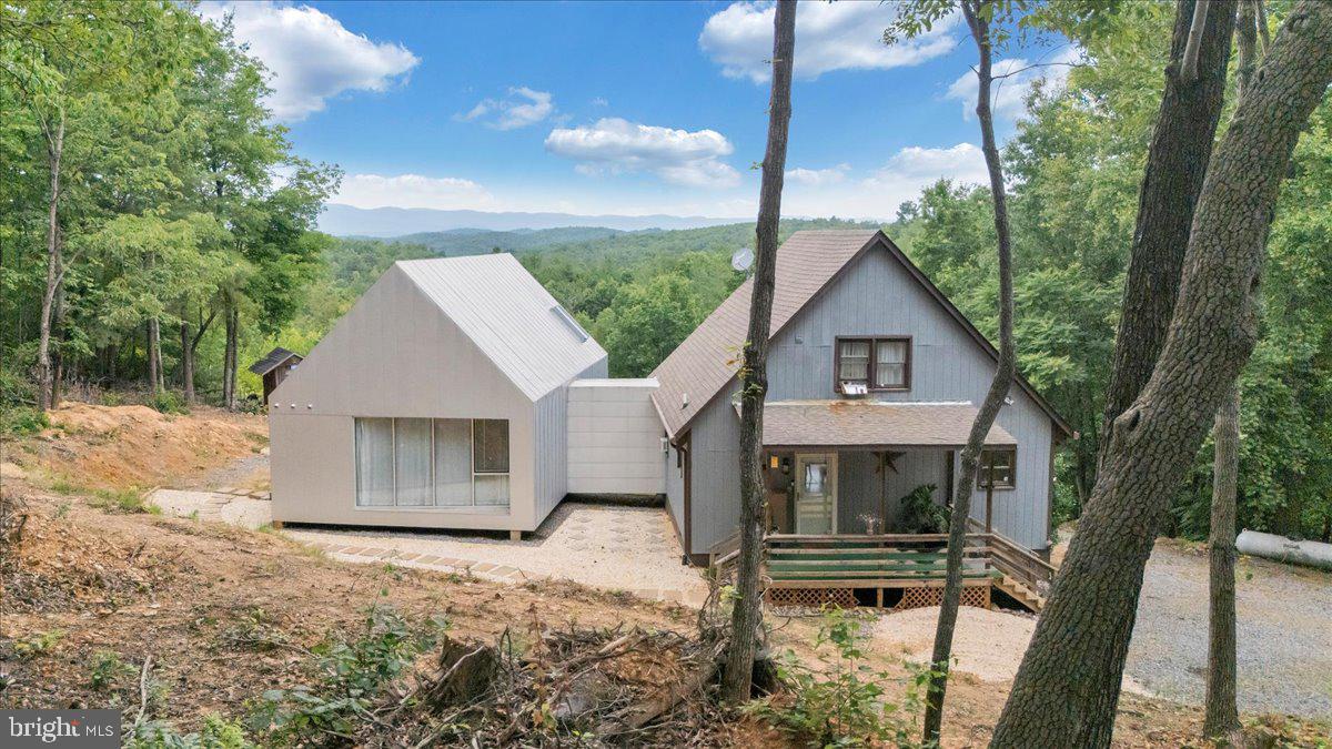 722 Foley Ridge Road Stuart, VA 24171 - Photo 3 of 67 Modern retreat nestled in nature's embrace.