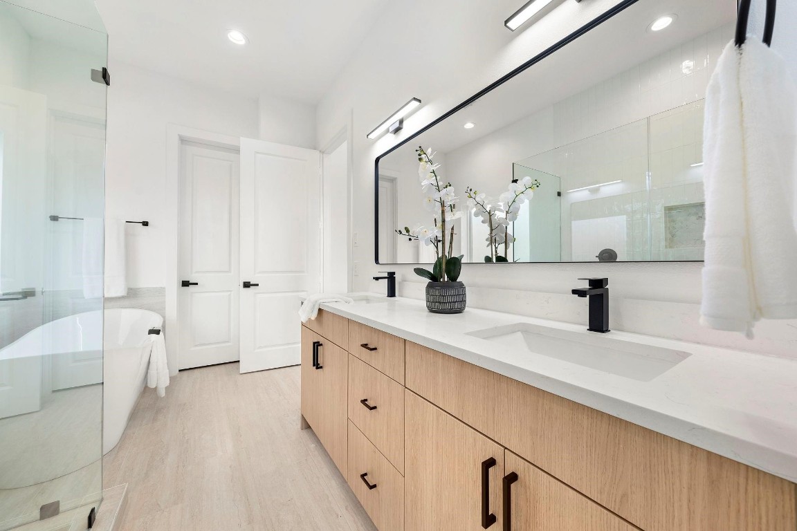 309 East 43rd Street Houston, TX 77022 - Photo 11 of 17 a spacious bathroom with a double vanity sink mirror and