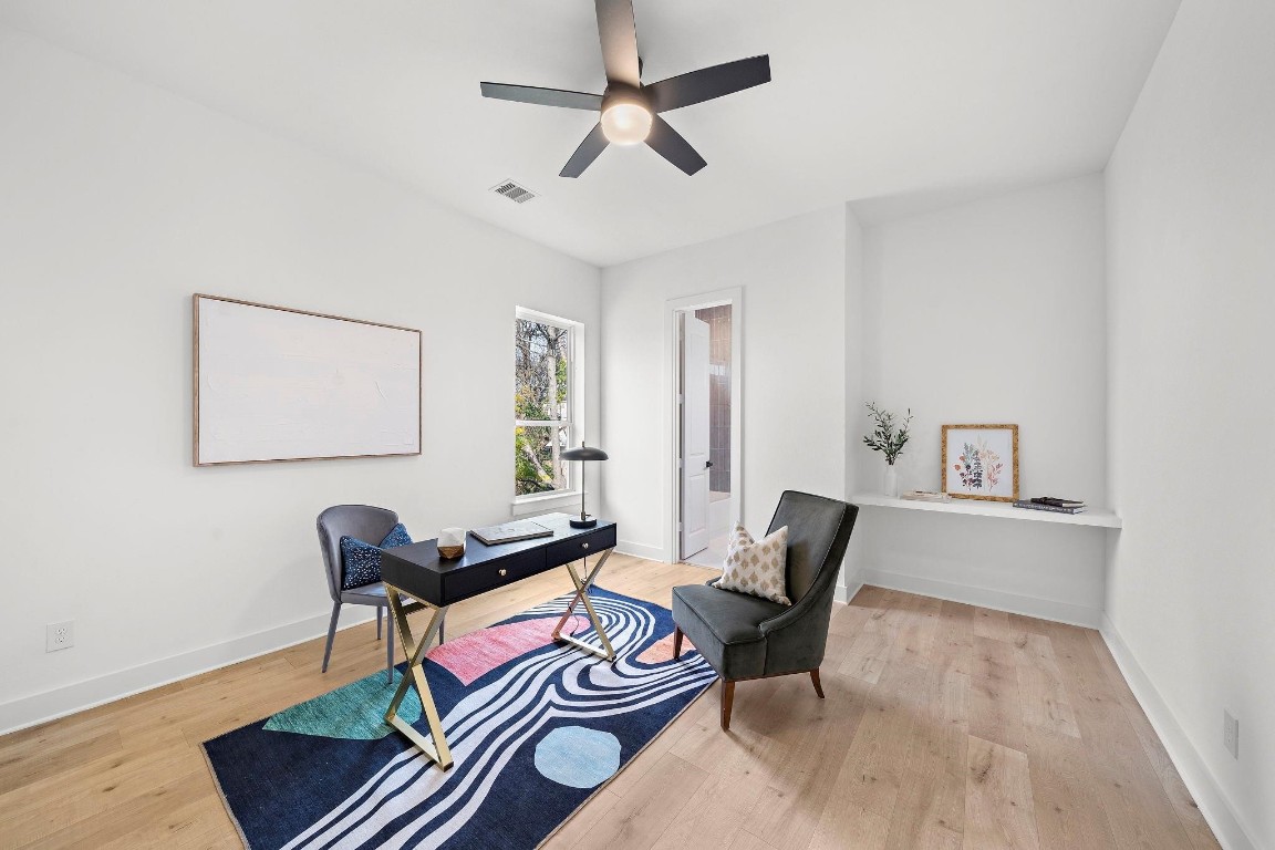 309 East 43rd Street Houston, TX 77022 - Photo 14 of 17 a living room with furniture and a wooden floor