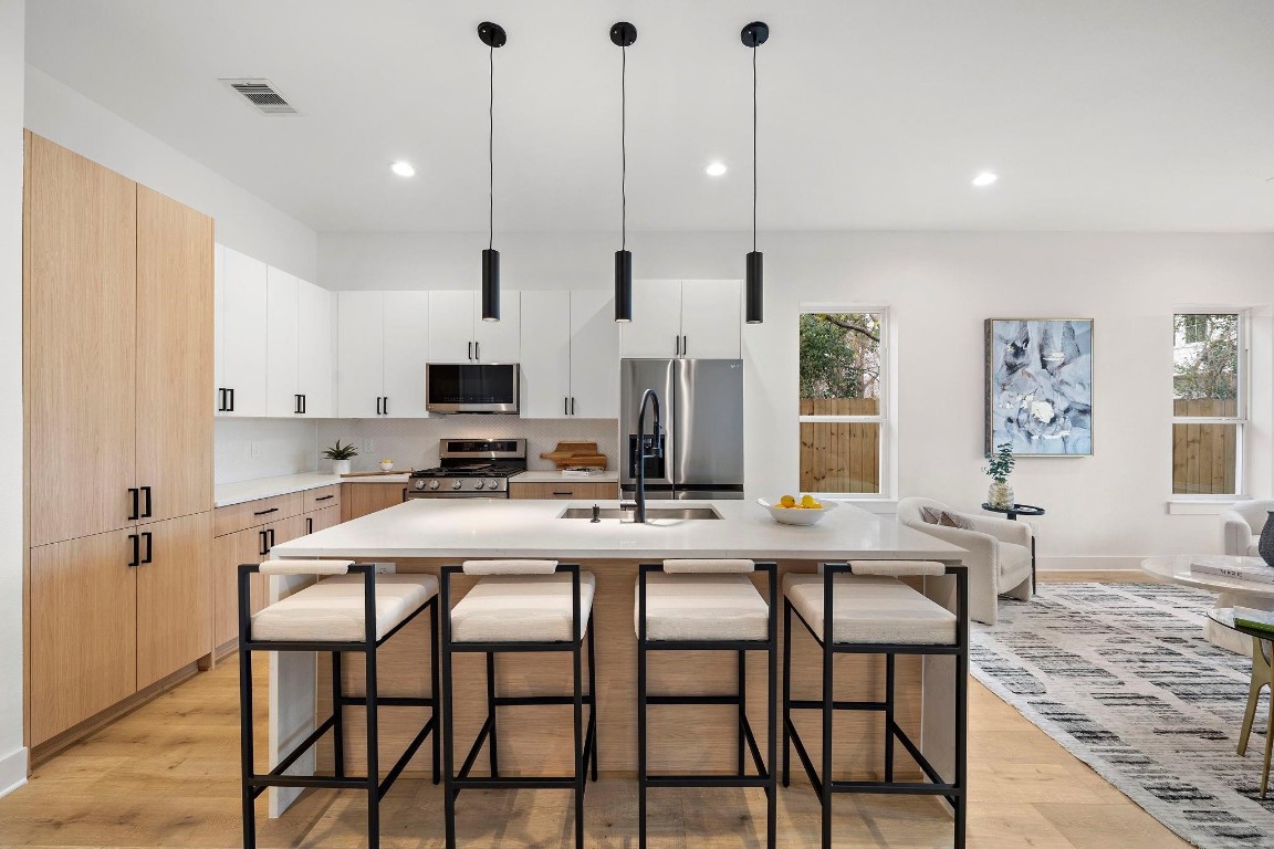 309 East 43rd Street Houston, TX 77022 - Photo 5 of 17 a view of a dining room with furniture