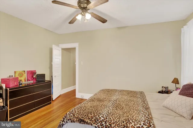 a bedroom with a bed and cabinets