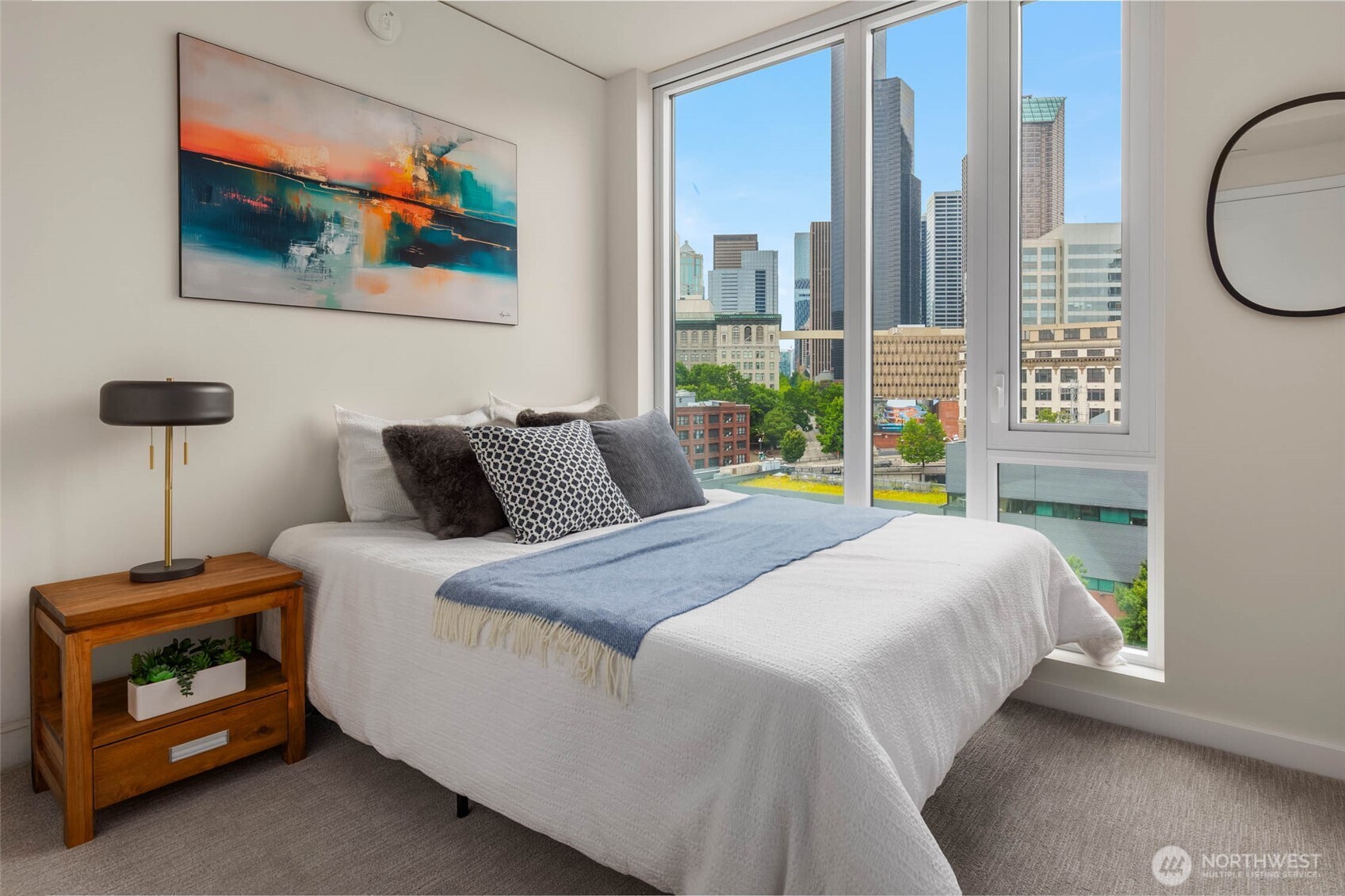 450 South Main Street, Unit 901 Seattle, WA 98104 - Photo 11 of 36 a bedroom with a bed and a window