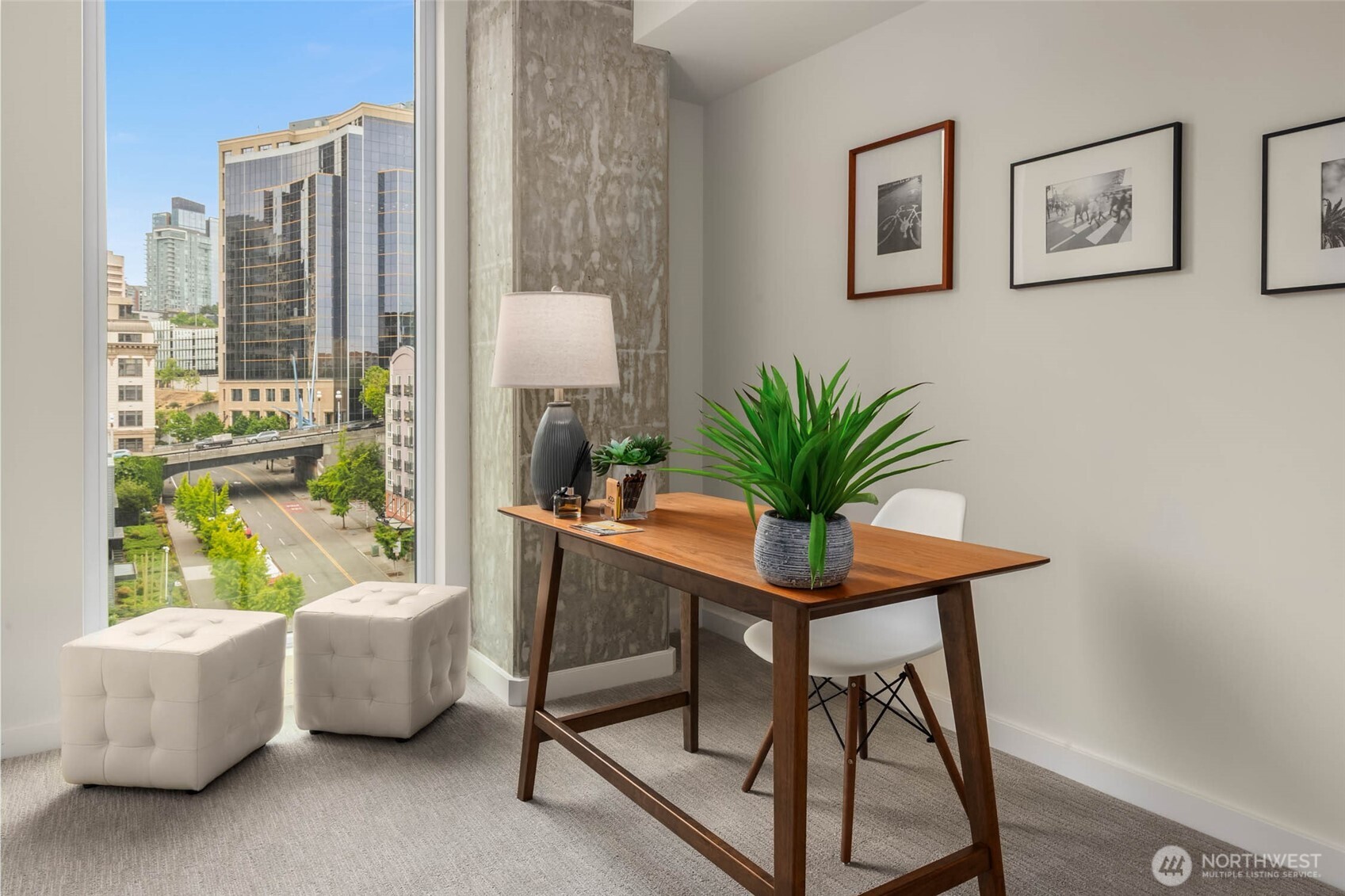 450 South Main Street, Unit 901 Seattle, WA 98104 - Photo 13 of 36 a view of a room with furniture and a potted plant