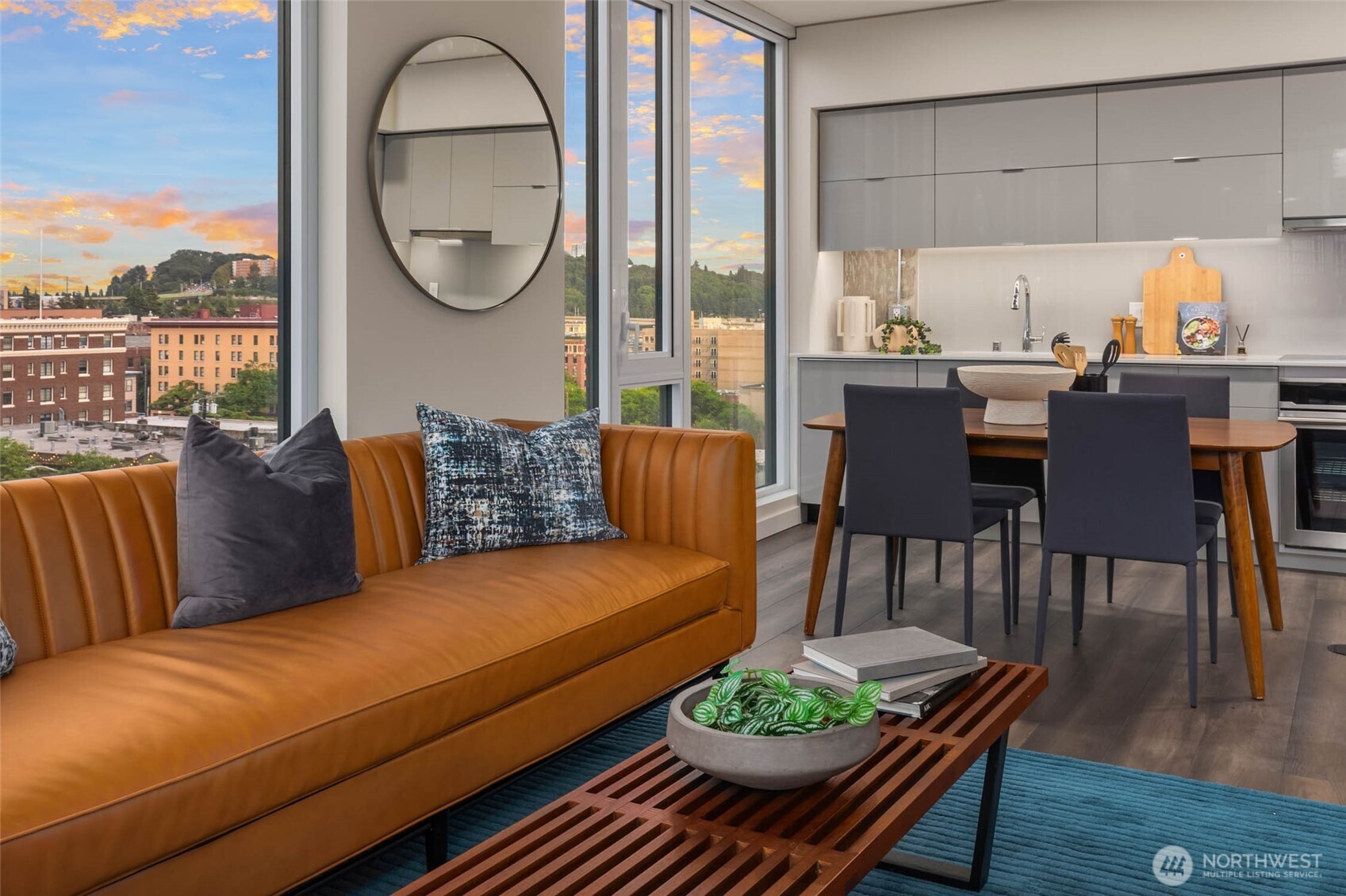 450 South Main Street, Unit 901 Seattle, WA 98104 - Photo 5 of 36 a living room with furniture and a large window