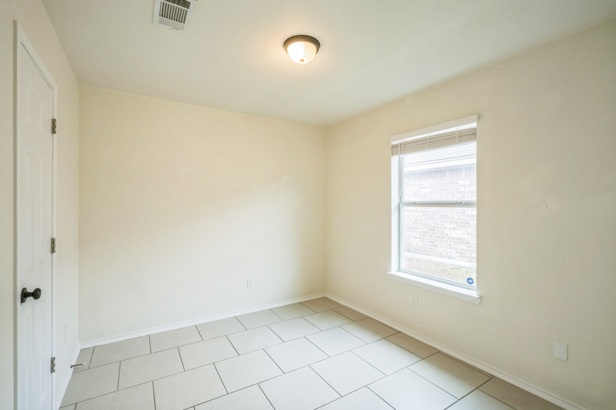 224 Amber Lane Jarrell, TX 76537 - Photo 14 of 16 Unfurnished bedroom with baseboards and a closet