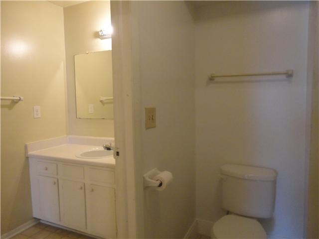 320 Welch Road, Unit M1 Nashville, TN 37211 - Photo 11 of 14 A picture of that zoned bathroom with a door for separation should you require it; the water closet shares a room with the combo tub/shower and the powder room has a single sink vanity.