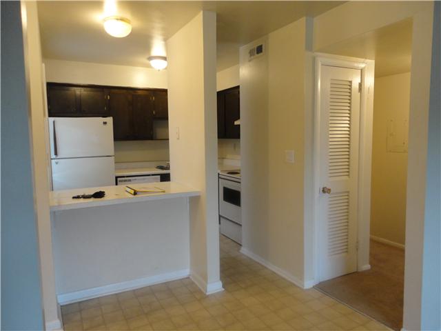 320 Welch Road, Unit M1 Nashville, TN 37211 - Photo 4 of 14 In this view; to the left is the front foyer with the front door, to the right is the hallway that will lead you to the Master bedroom or the zoned bathroom