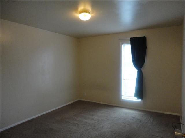320 Welch Road, Unit M1 Nashville, TN 37211 - Photo 7 of 14 The master bedroom is large enough to easily accommodate a queen sized bed; as well as other required furniture. From the window you can see your covered patio.
