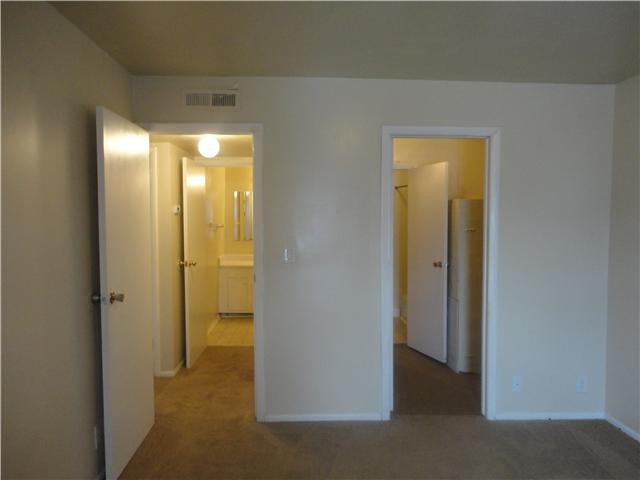 320 Welch Road, Unit M1 Nashville, TN 37211 - Photo 8 of 14 From the Master you have 2 doors; left takes you to the hallway which leads to the zoned bathroom or the door to the right takes you to a walkin closet which is attached to the water closet and shower.