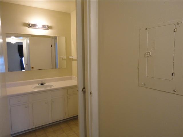320 Welch Road, Unit M1 Nashville, TN 37211 - Photo 9 of 14 The powder room of this zoned bathroom has lots of cabinet space as well as under cabinet storage.